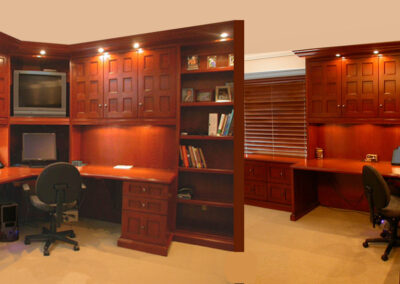 Beautiful custom desk in an executive office by Heartwood Custom Cabinetry